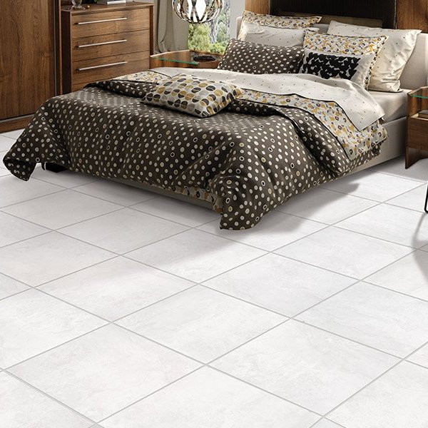Light tile floors in a bedroom