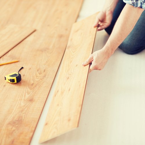 handyman with tools on the floor