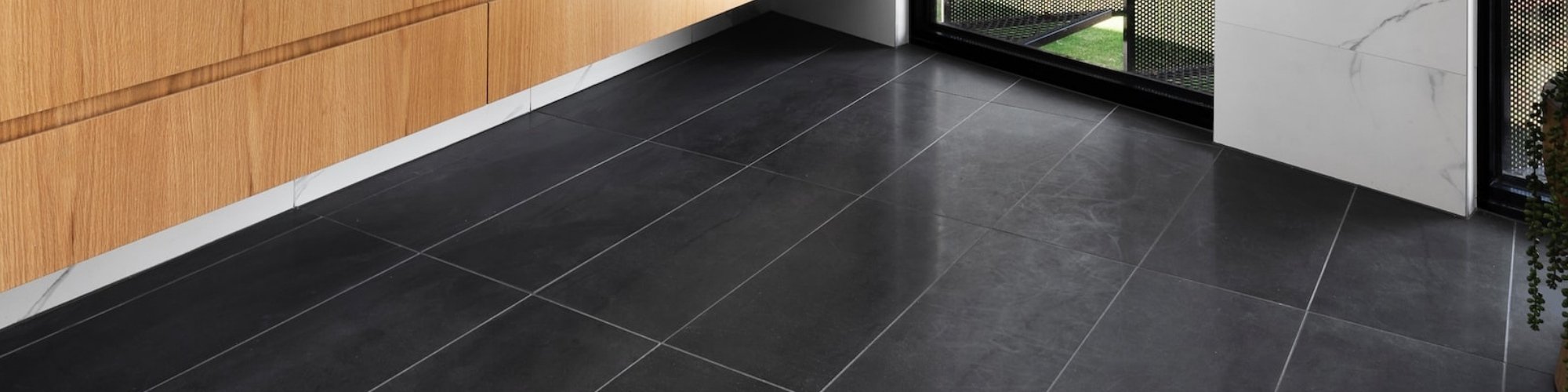 Dark tile in a modern bathroom