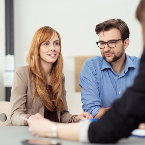 Person consulting with a well dressed specialist